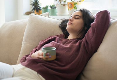 24-7 and respite care Woman resting on a couch
